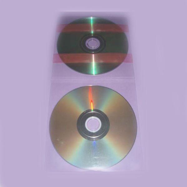 Sobre 2 CD + adhesivo posterior
